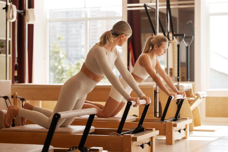 full-shot-women-doing-pilates-together (5)